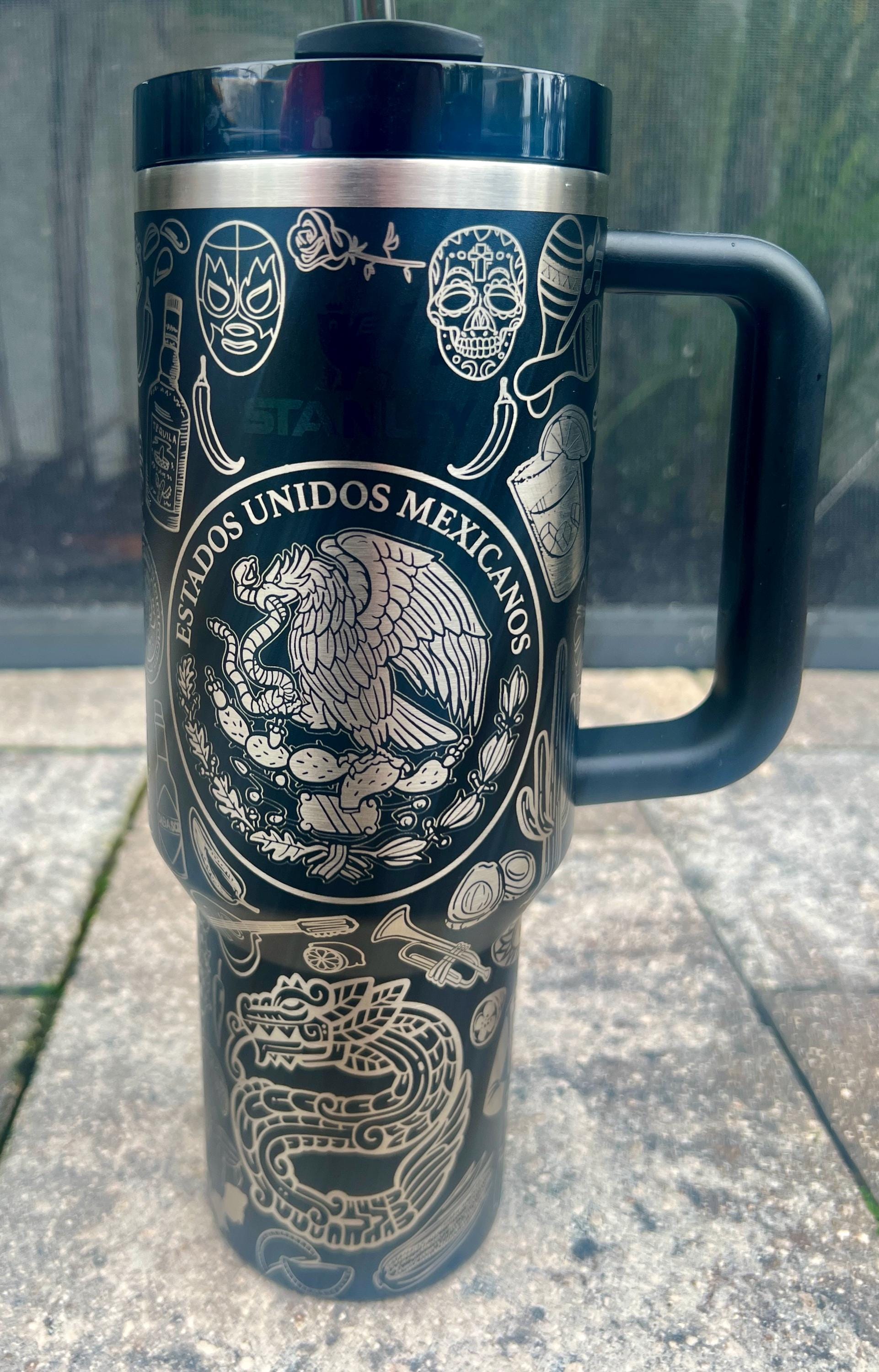 Mexican eagle and serpent emblem engraving in a highly detailed cultural design on a Black Stanley 40oz Quencher H2.0 full-wrap tumbler.